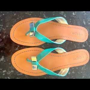 Beautiful, never been worn Coach leather sandals.